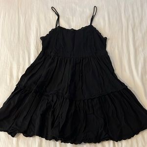 Black linen-style Urban Outfitters dress with lace detail